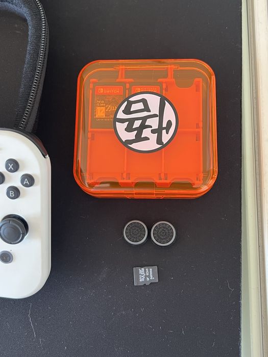 Switch OLED com extras + Wii Sports