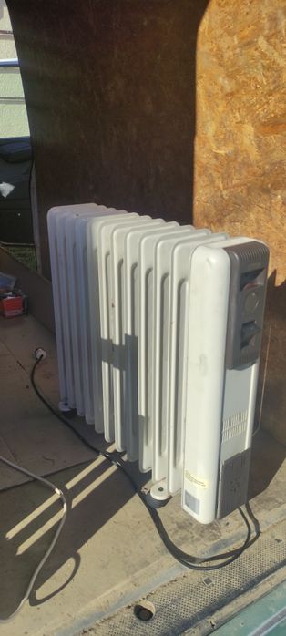 Масляні обігрівачі