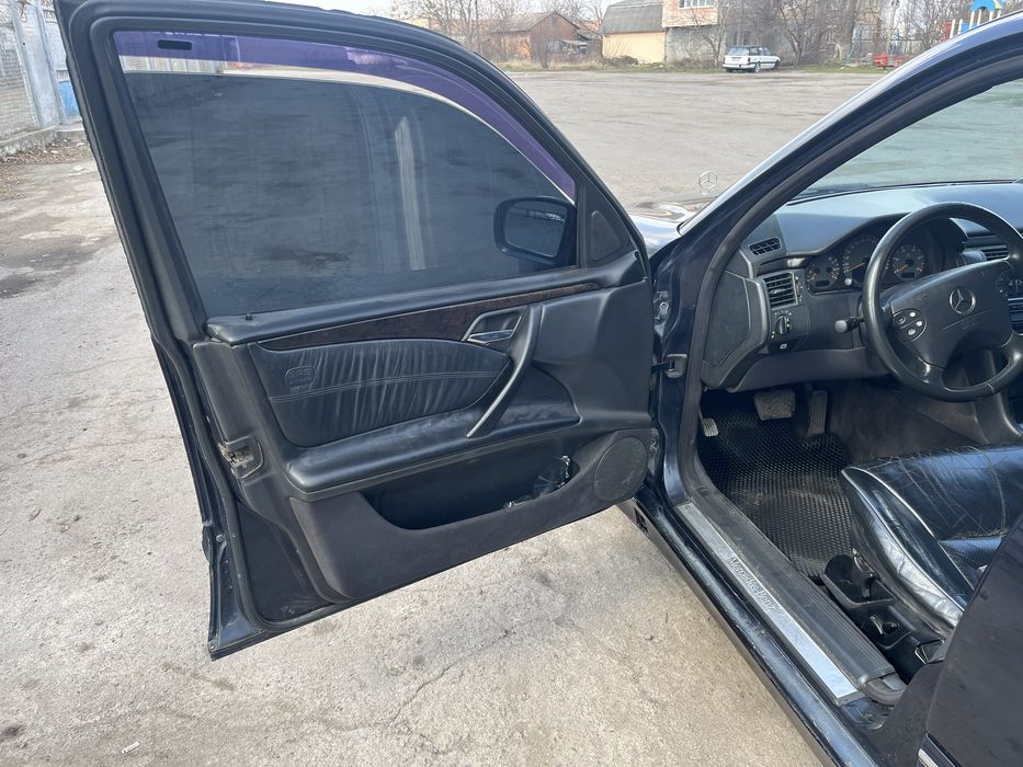 Мерседес Бенз 210