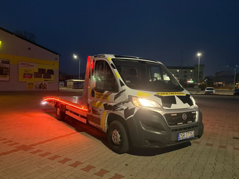 Pomoc drogowa, holowanie,  transport samochodów