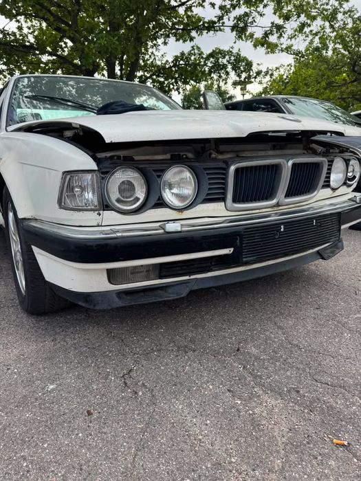 Бампер BMW E32 з омивачями