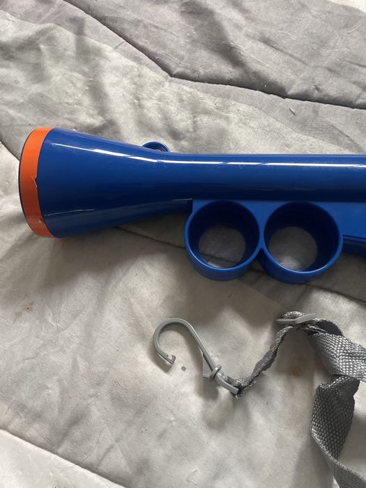 Atirador de bolas para animais