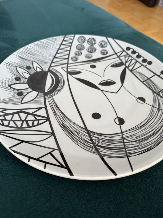 Talerz ozdobny chodzież