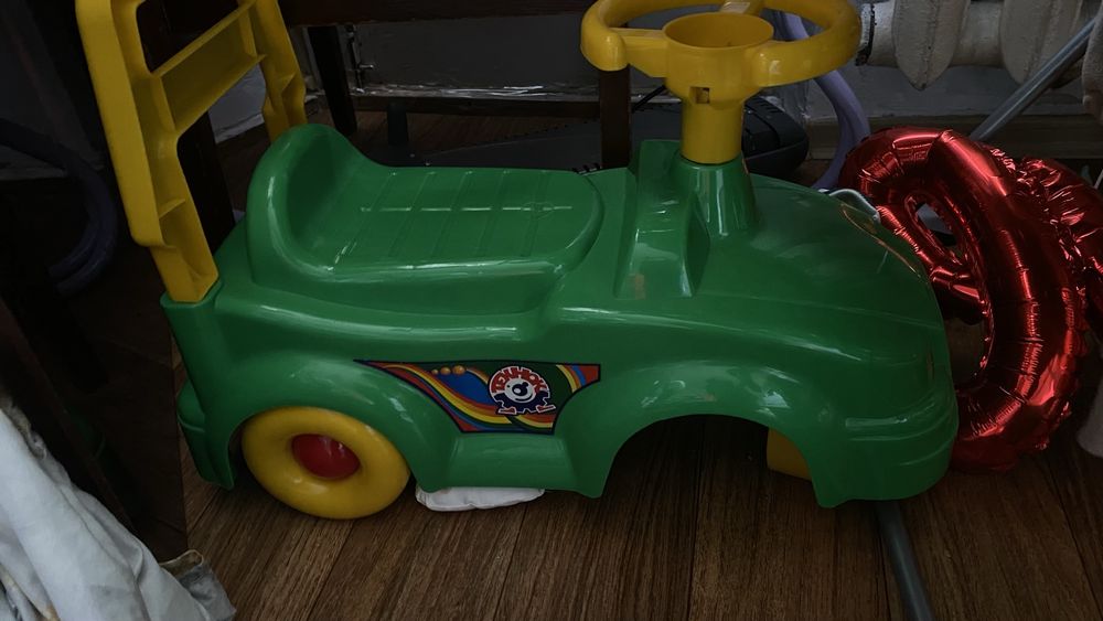 Машинка каталка толокар