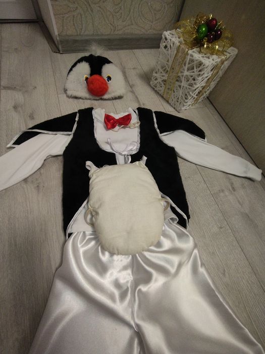 Здам на прокат костюм пінгвінчика та дитячу сукню