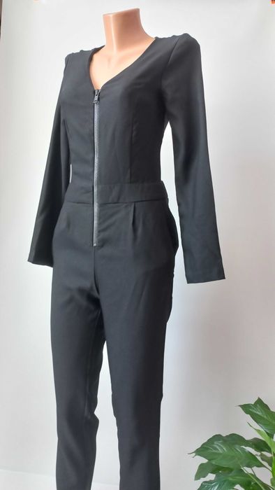Чорний комбінезон  44 розмір новий