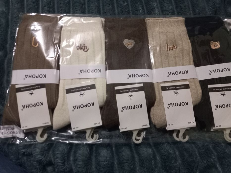 Теплі шерстяні шкарпетки в рубчик із шерсті альпаки.