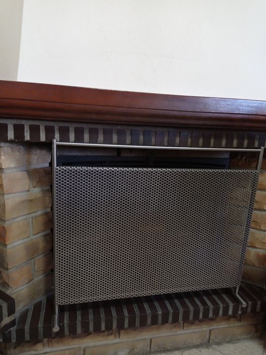 Painel de proteção para lareira