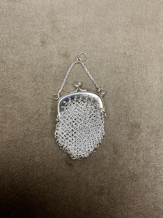 Medalha porta moedas em prata