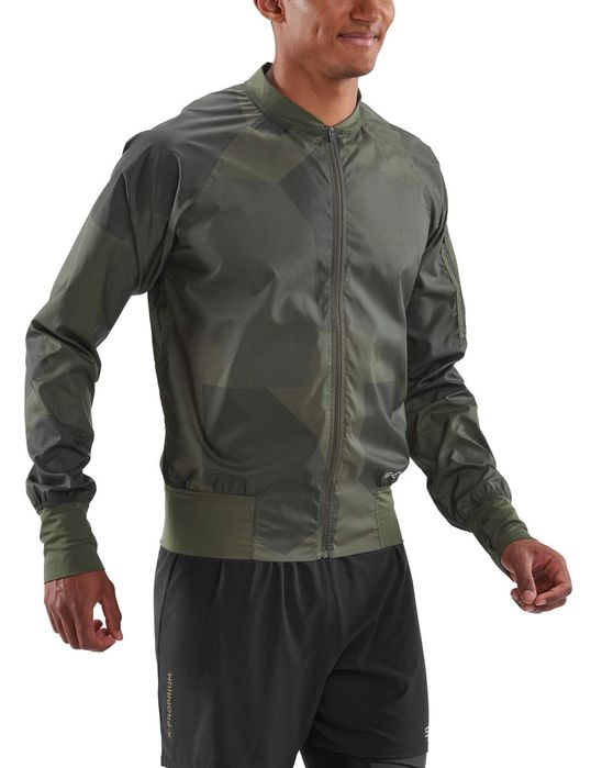 Бігова вітровка SKINS, розмір L, нова