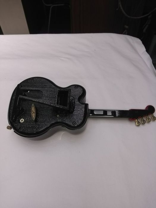 Imitação de violino, com música