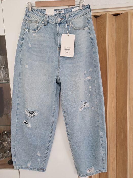 Spodnie jensy z rozdarciami roz L