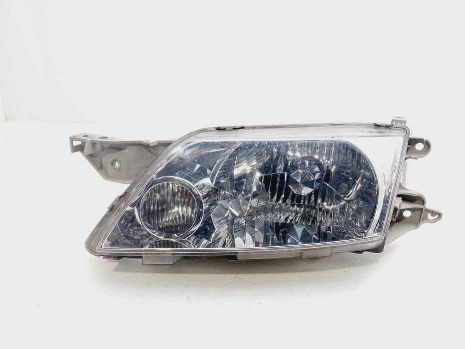 farol esquerdo mazda premacy
