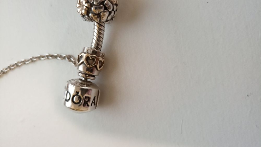 Pulseira e contas Pandora Ouro