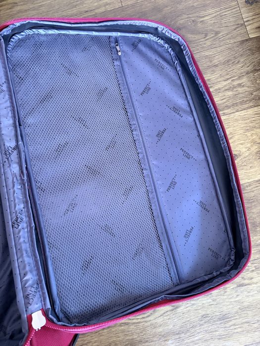 Дорожня валіза на колесах, стан нової