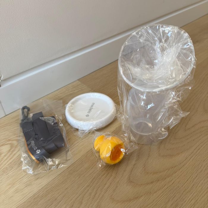 Kit Amamentação com Bomba, acessórios, cremes, discos protetores, etc