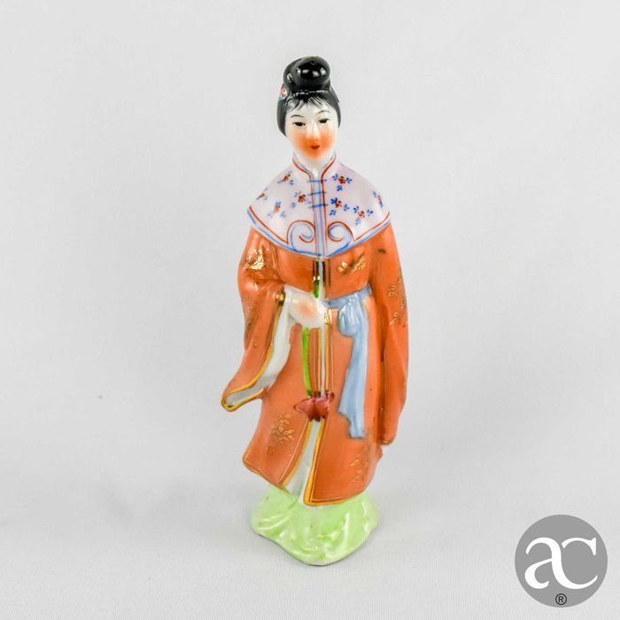 Figura porcelana da China de uma Mulher chinesa