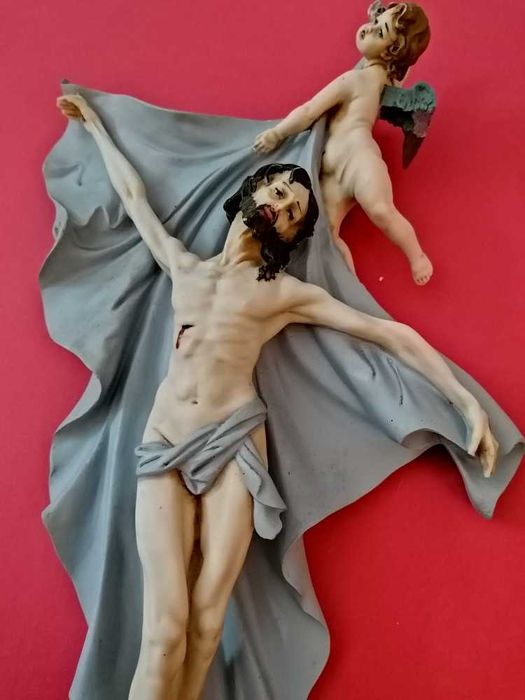 Escultura de Cristo e anjo em marfinite