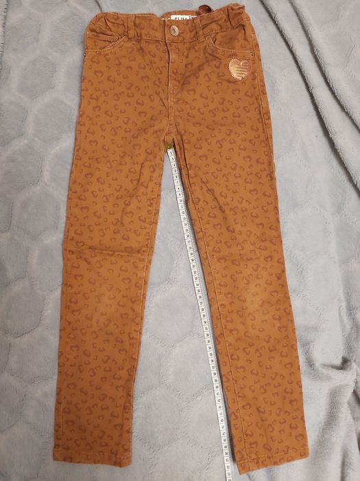 Spodnie jeansy rude panterka r. 128