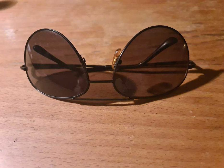 oculos rayban com hastes metalicas