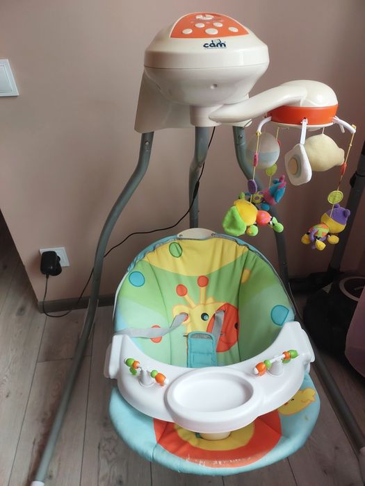 Заколисуючий центр,гойдалка