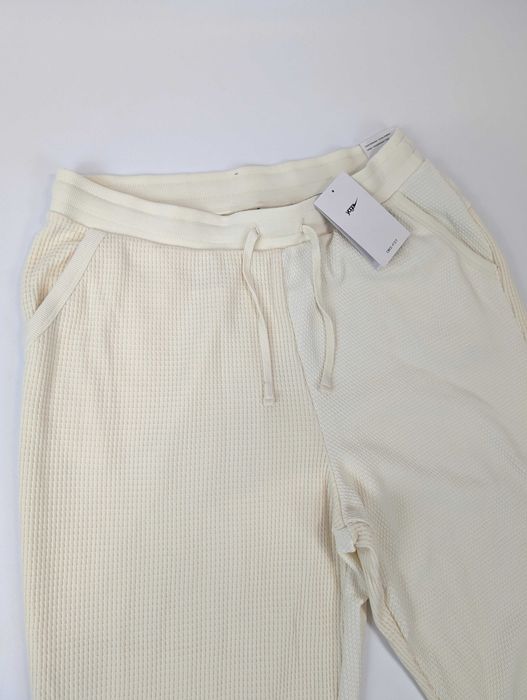 Spodnie Dresowe Nike Yoga Luxe Joggery Waflowe Bawełna nowe z Metką L Ecru