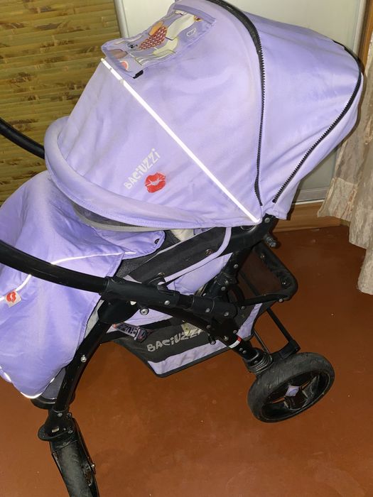 Дитяча прогулянкова коляска з перекидною ручкою Baciuzzi