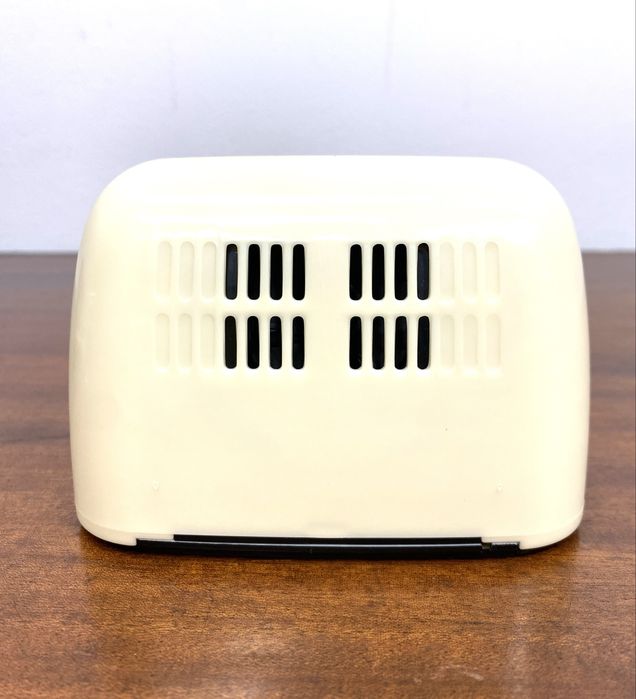 Mini rádio a pilhas.