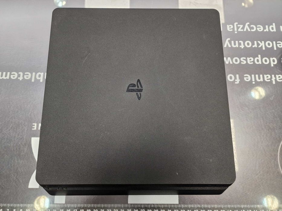 PS4 Slim 1TB + oryginalny dualshock / + 4 gry video / Grade B / Gwarancja 12 miesięcy / Playstation 4 Slim