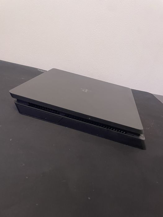 ps4 slim  e comando nao original