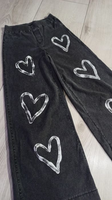 Spodnie jeansy 40 zł para 152