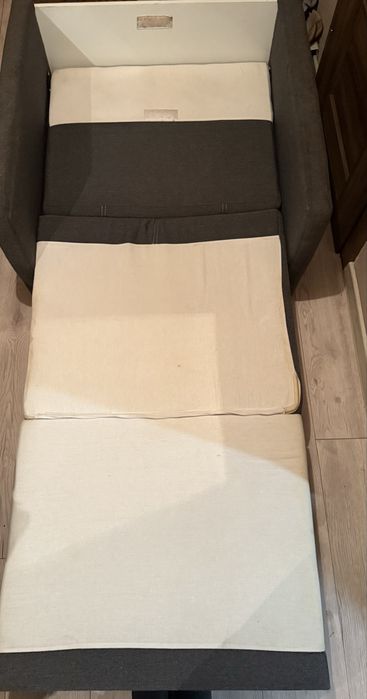 Fotel z funkcją łóżka rozkładanego z pojemnikiem na pościel