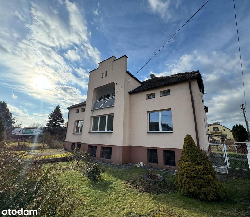 Przestronne mieszkanie (140 m²) z działką, piwnicą oraz garażem.