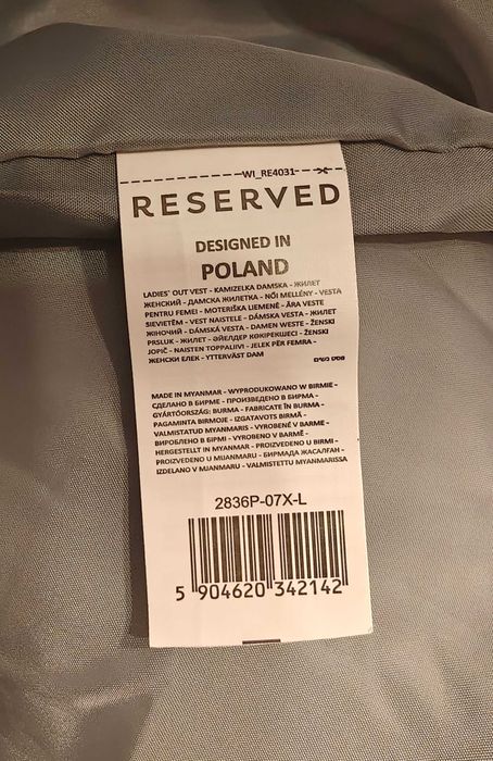 Kamizelka damska ciepła z kapturem.