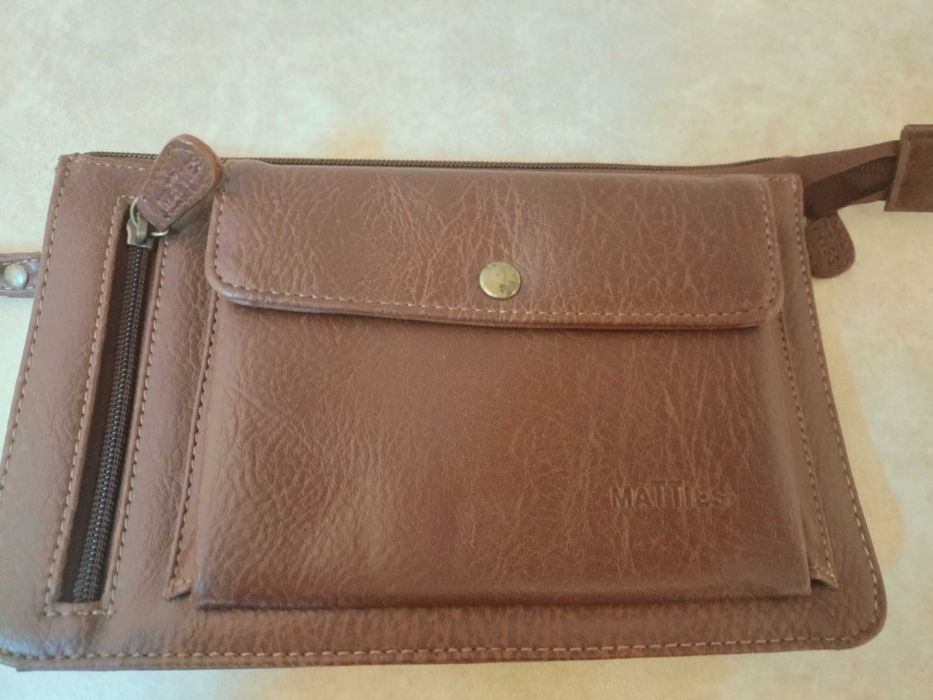 Carteira e Bolsa de pulso para homem em pele novos