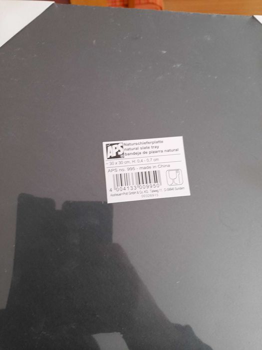 Tábuas de ardósia de marca alemã para servir comida.