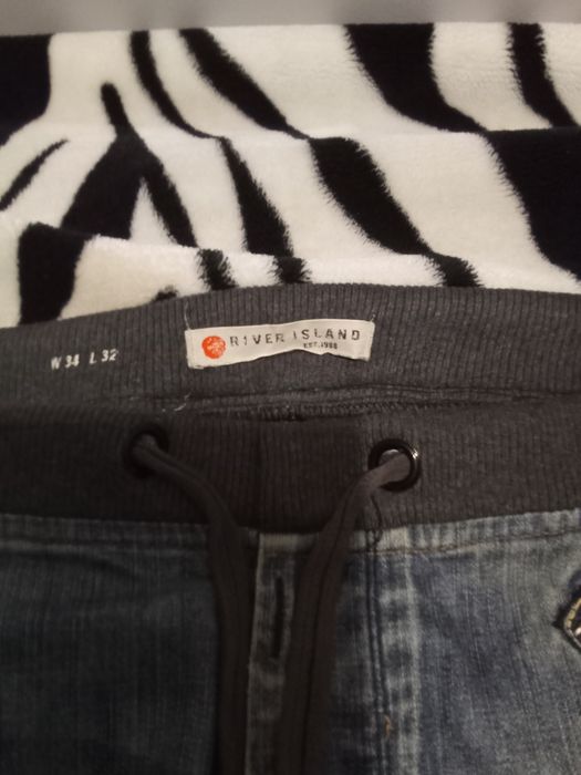 Spodnie joggery męskie River Island