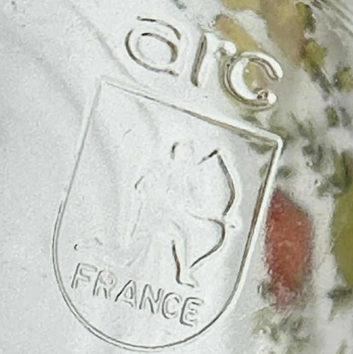 Frasco de vidro com tampa.