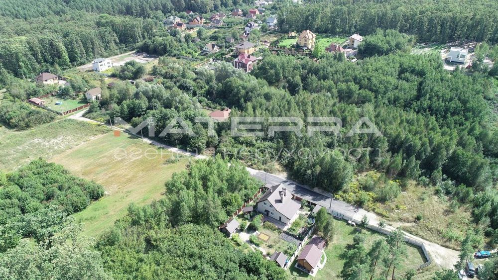 Стоянка продаж кутової ділянки 10 соток в оточенні лісу - Вид 6