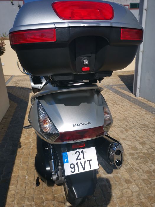 Honda Silverwing 600 e BMW C1 Vendo as duas por 8700  "como  novas"