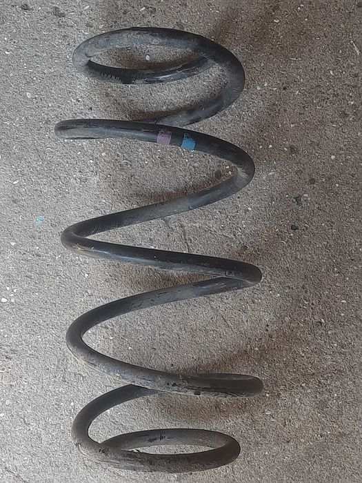 Амортизатор передній Nissan Qashqai  з пружиною