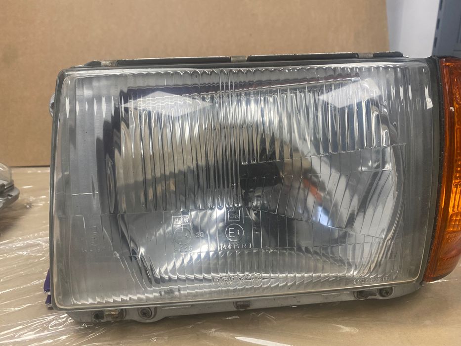 Reflektory , lampy przód 107 Mercedes