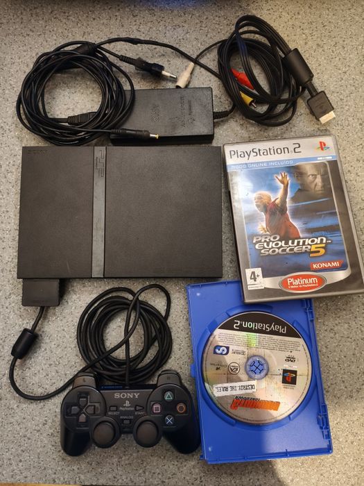 PlayStation 2 + comando + jogos