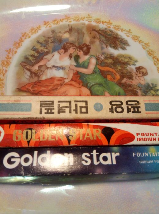 Ручки с золотыми и иридиевыми перьями, подстаканники