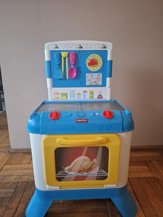 Kuchenka zabawkowa Fisher Price.