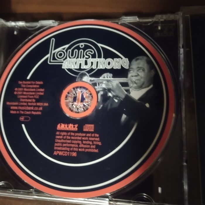 4 płyty CD  Louis Armstrong,Miles Davis,