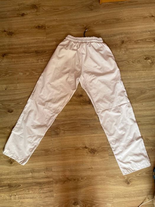 Білі штани спортивні