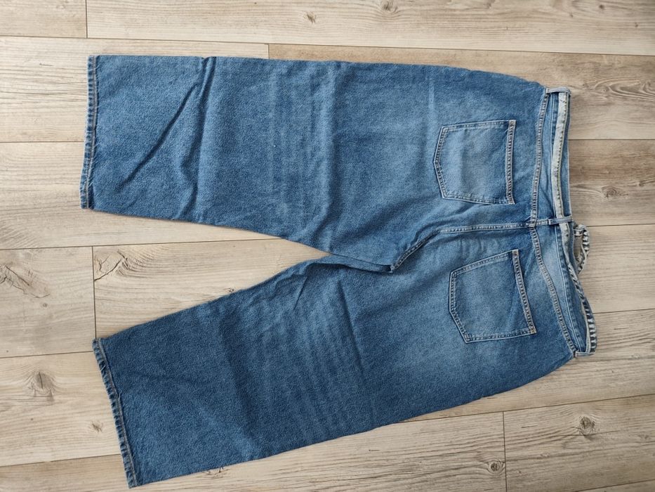 Spodnie jeansowe damskie z paseczkiem r. 52