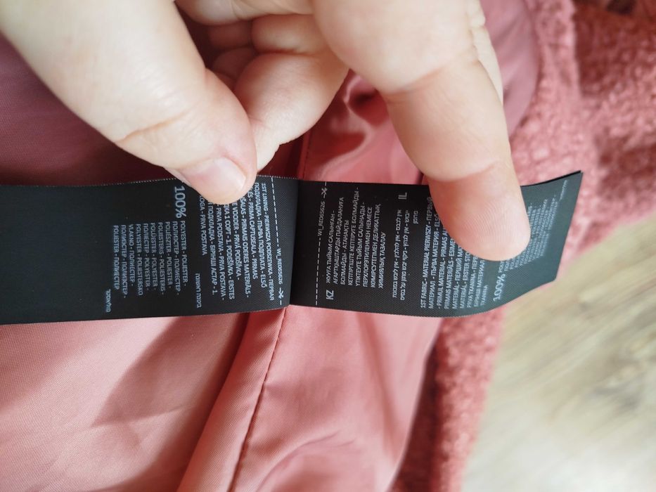 Płaszcz damski z sztucznego baranka Reserved