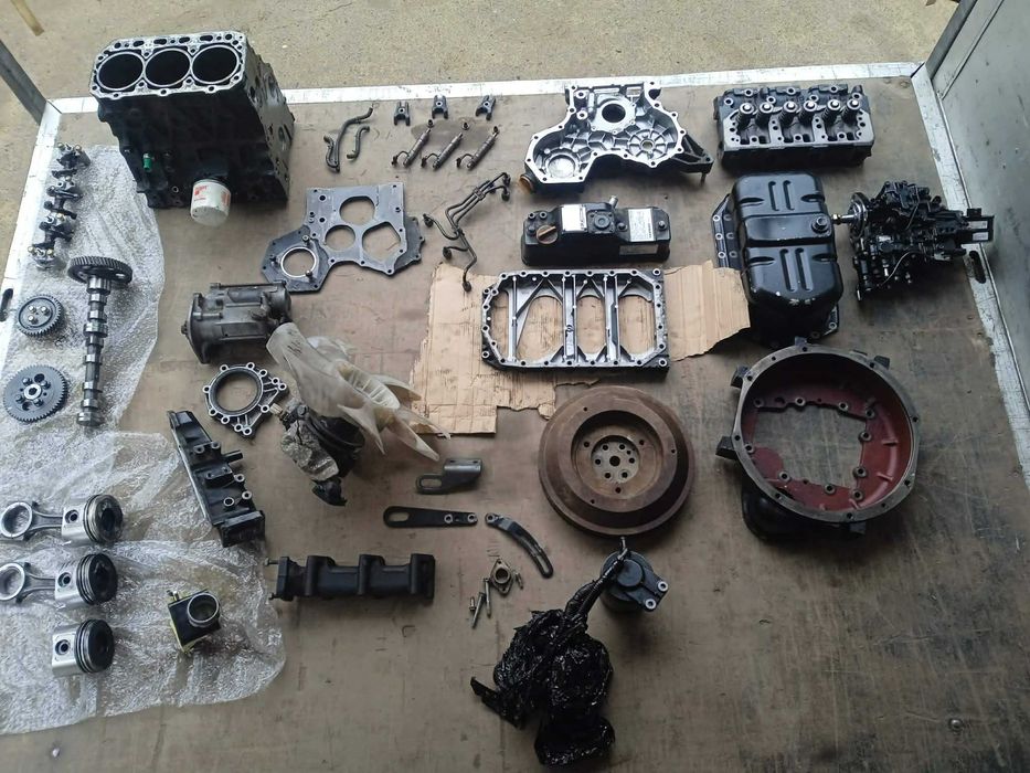 Yanmar 3tnv88 głowica wtryski rozrusznik wałek rozrządu pompa wody koło zębate zamachowe tłok blok